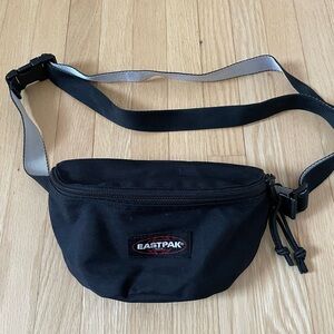 Eastpak Black Waist Bag with Reflective Strap Accent